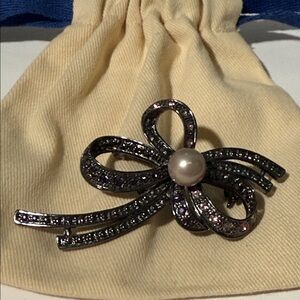 Elegant Black Bow Brooch with Pearl Accent